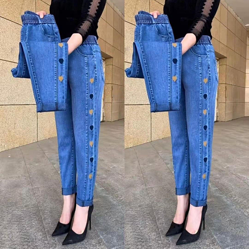 🔥Vendita calda🔥Jeans ricamati da donna con motivo a cuore ad alta elasticità