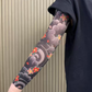 Manicotti Ultra Sottili con Protezione Solare e Stampa Effetto Tatuaggio