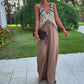 Tuta Vintage Chic con Scollo Profondo a V