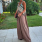Tuta Vintage Chic con Scollo Profondo a V