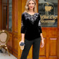 Completo top e pantaloni da donna in velluto con strass