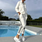 Completo giacca con cappuccio e pantaloni con coulisse da donna