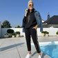 Completo giacca con cappuccio e pantaloni con coulisse da donna