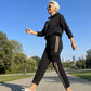 Completo giacca con cappuccio e pantaloni con coulisse da donna