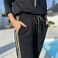 Completo giacca con cappuccio e pantaloni con coulisse da donna