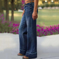 Jeans a zampa da donna retrò con tasche